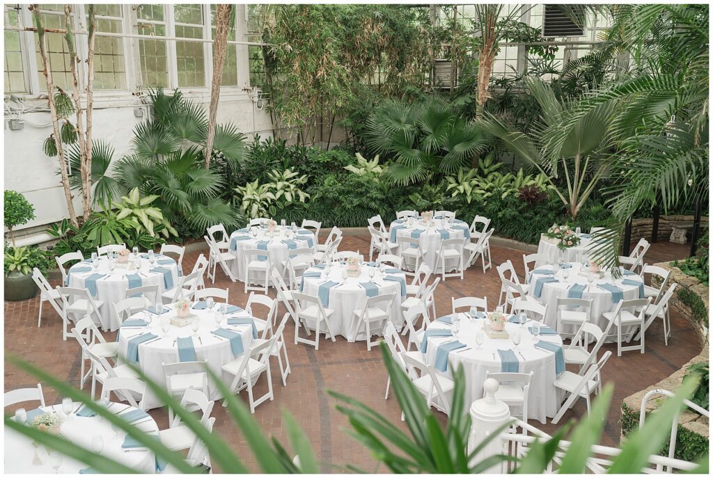 Empty reception space set up for a Franklin Park Conservatory wedding. Photo taken by Columbus wedding photographer Amanda Lauren Collective